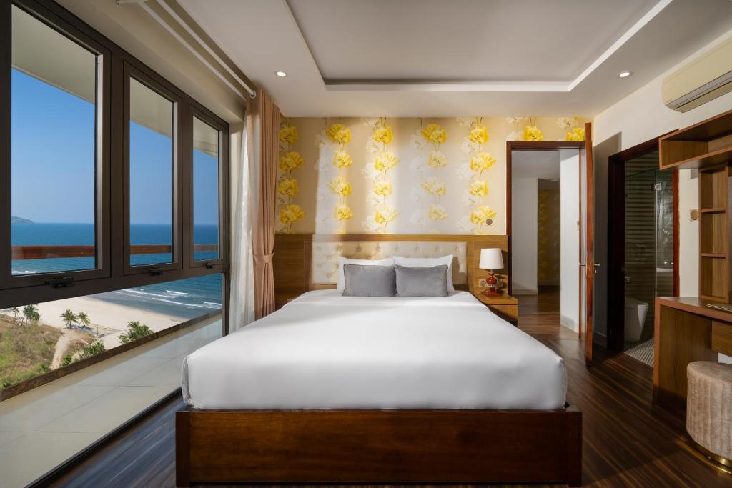 Postel nebo postele na pokoji v ubytování 7 Seven Sea Hotel