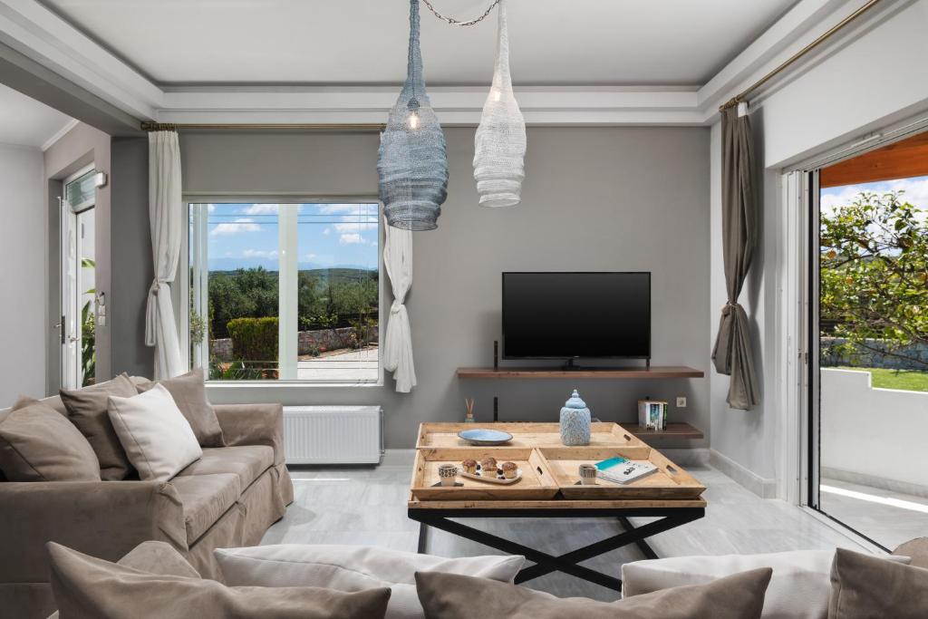 TV a/nebo společenská místnost v ubytování Villa Tranquilla