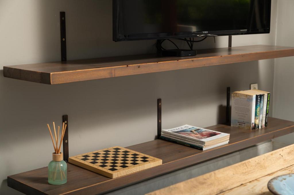 TV a/nebo společenská místnost v ubytování Villa Tranquilla