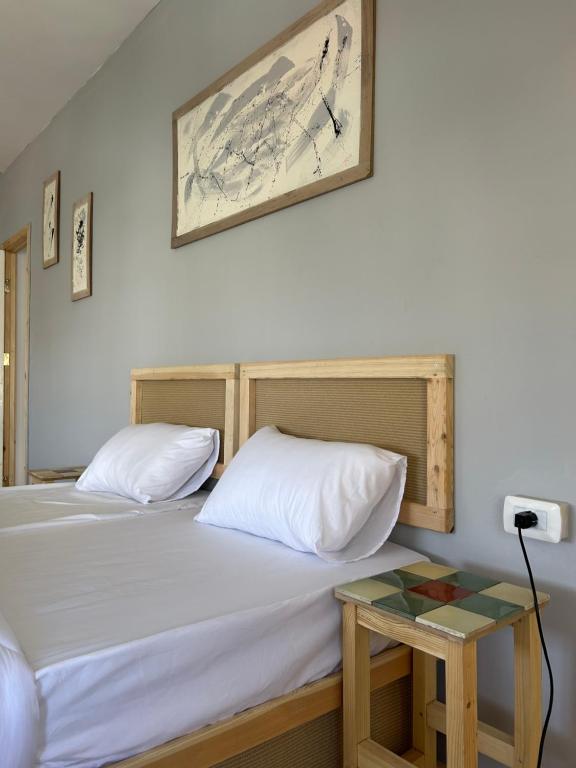 Кровать или кровати в номере Crafthouse