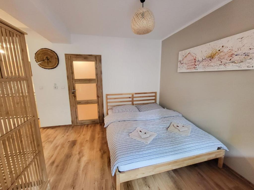 Postel nebo postele na pokoji v ubytování Apartmán Na Svahu, Krkonoše