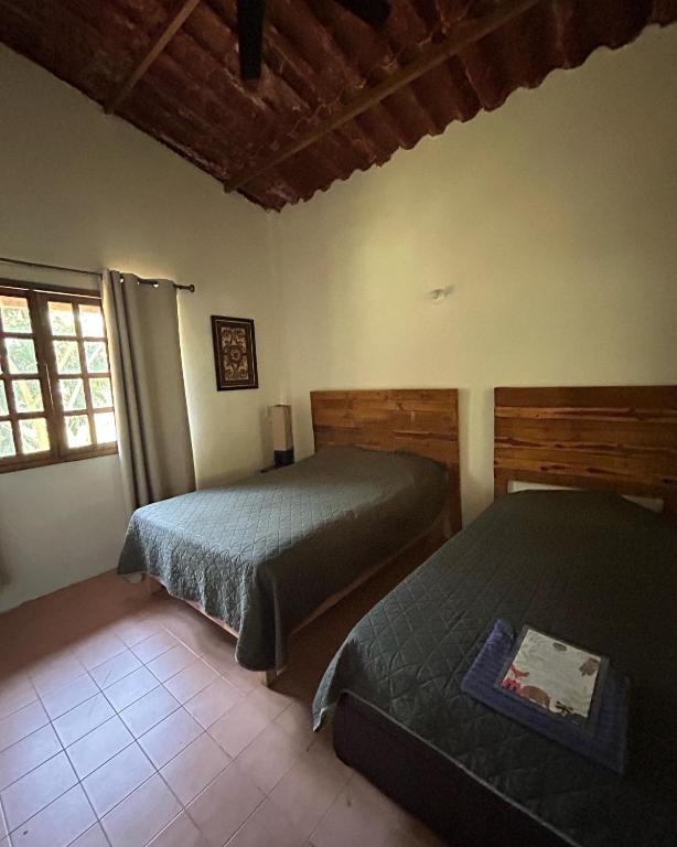 Postel nebo postele na pokoji v ubytování Rancho tres Marías