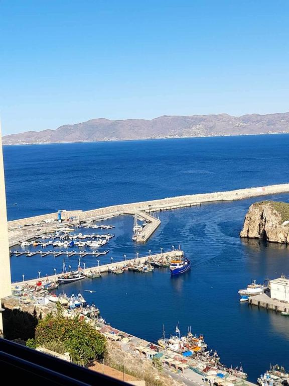 a view of a harbor with boats in the water at Al-marsa2 in Al Hoceïma