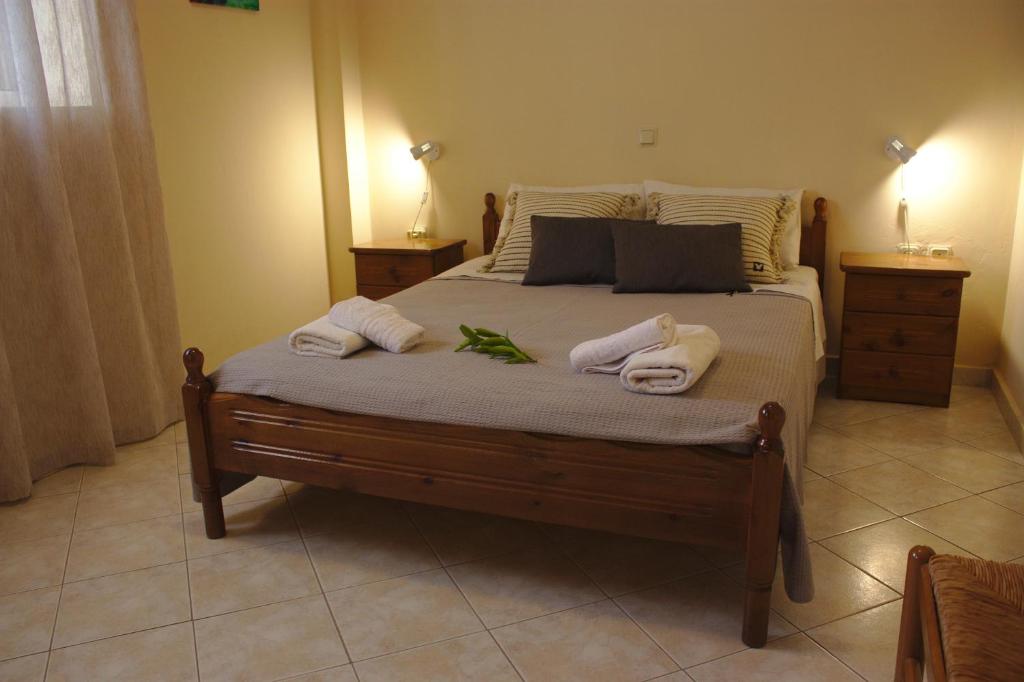 Postel nebo postele na pokoji v ubytování Bouka Apartment