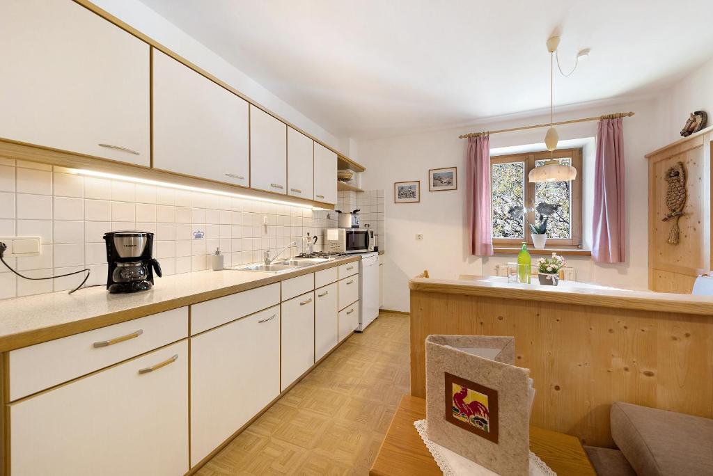 Kuchyň nebo kuchyňský kout v ubytování Moar im Rumsein - Apt Saltenblick