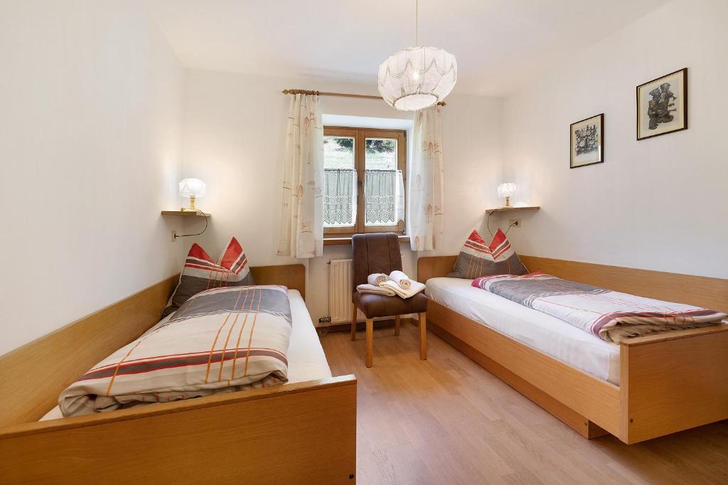 Postel nebo postele na pokoji v ubytování Moar im Rumsein - Apt Saltenblick