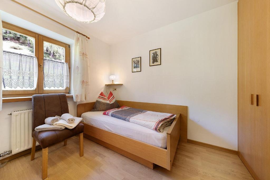 Postel nebo postele na pokoji v ubytování Moar im Rumsein - Apt Saltenblick