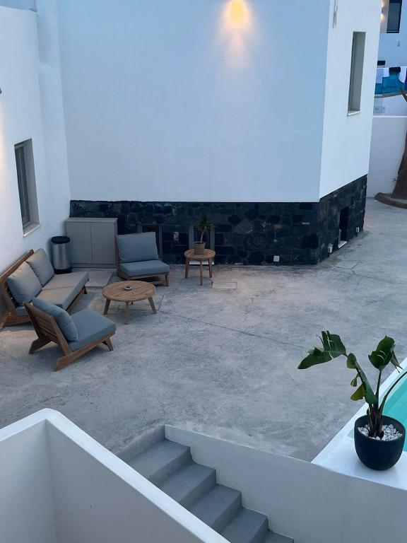Posezení v ubytování Noir Santorini