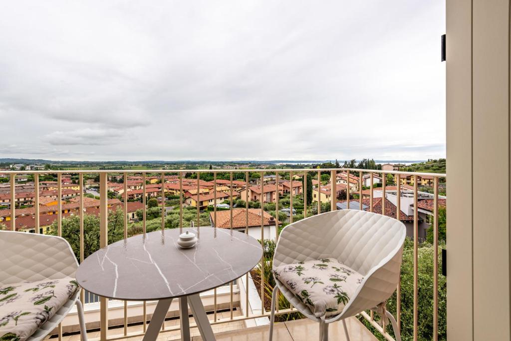 A balcony or terrace at Cavalino Boutique 1