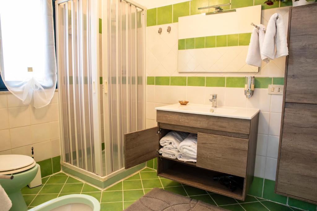 Koupelna v ubytování Beddamuri home