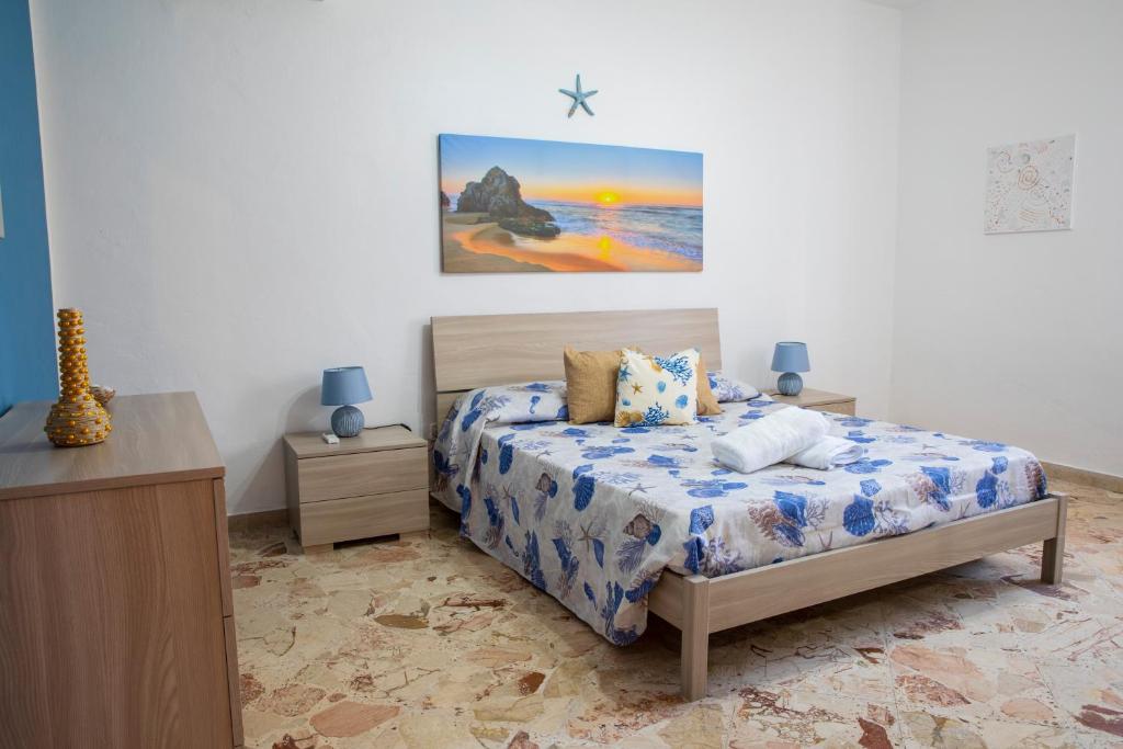 Postel nebo postele na pokoji v ubytování Beddamuri home