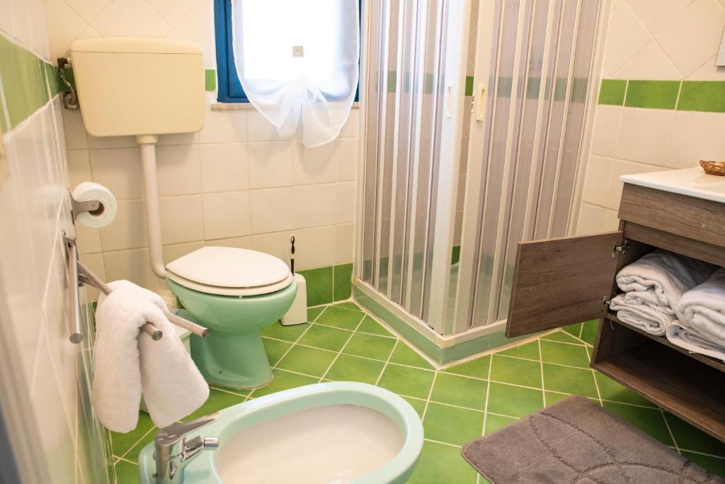 Koupelna v ubytování Beddamuri home
