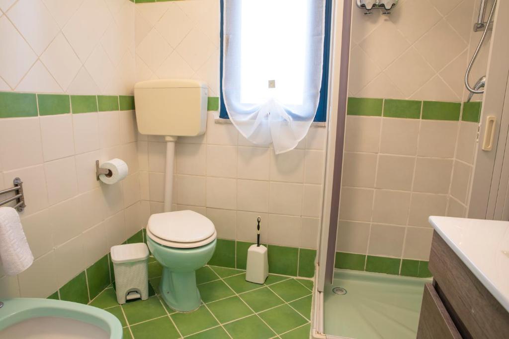 Koupelna v ubytování Beddamuri home