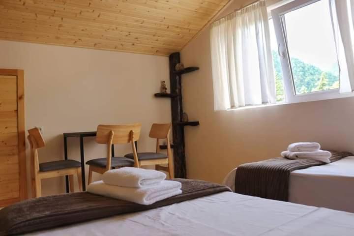 Postel nebo postele na pokoji v ubytování Gallery