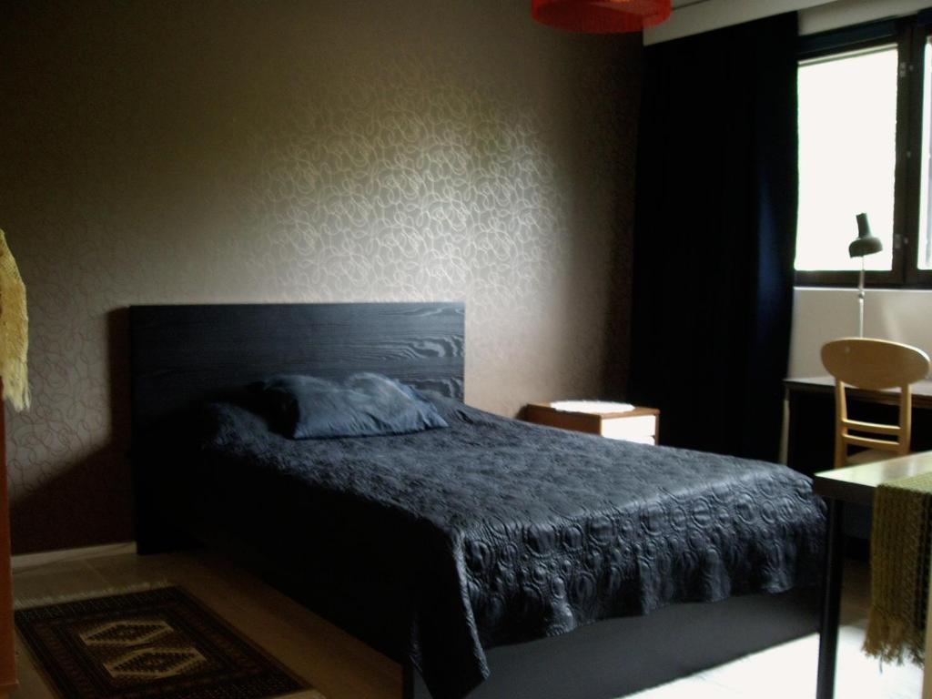 En eller flere senge i et værelse på 21 minutes from Helsinki city - smaller room