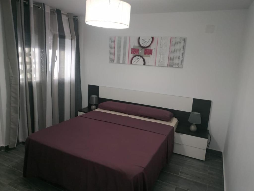 Posteľ alebo postele v izbe v ubytovaní Cullera Relax