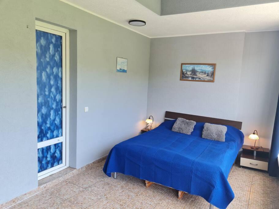 Postel nebo postele na pokoji v ubytování Imperial Fort Club Apartament