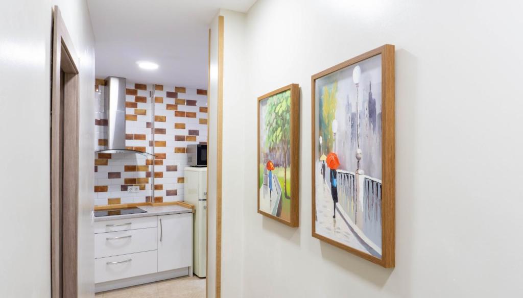 Kuchyňa alebo kuchynka v ubytovaní San Juan Apartment Málaga Center