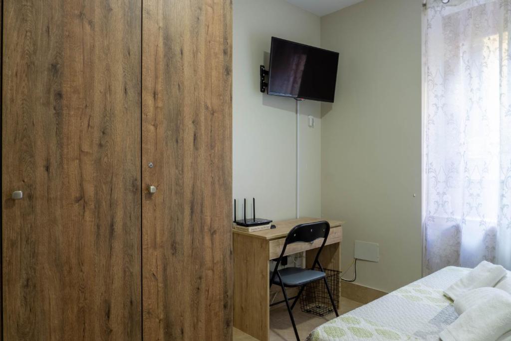 Televízia a/alebo spoločenská miestnosť v ubytovaní San Juan Apartment Málaga Center