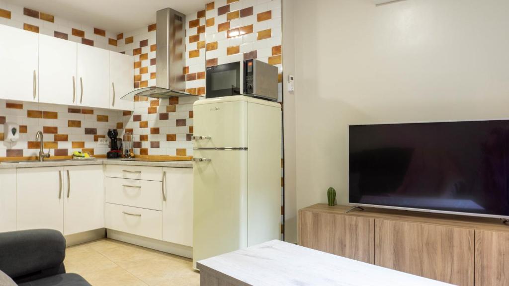 Kuchyňa alebo kuchynka v ubytovaní San Juan Apartment Málaga Center