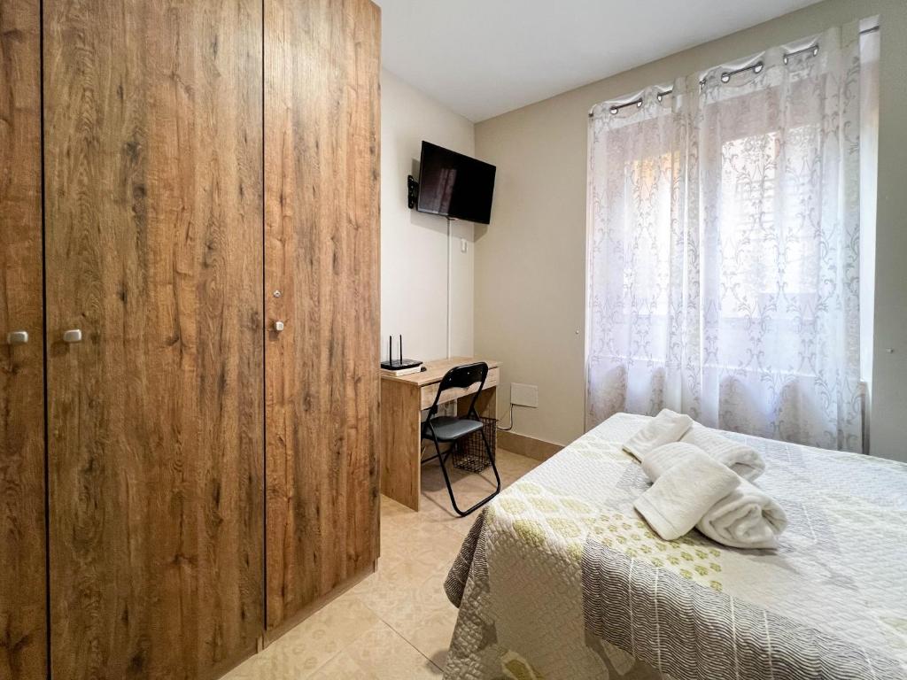 Posteľ alebo postele v izbe v ubytovaní San Juan Apartment Málaga Center