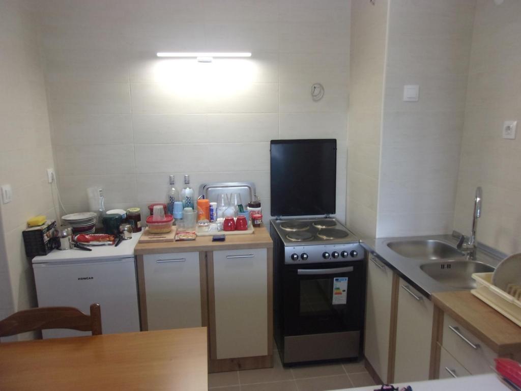 Kuchyň nebo kuchyňský kout v ubytování Rooms Port