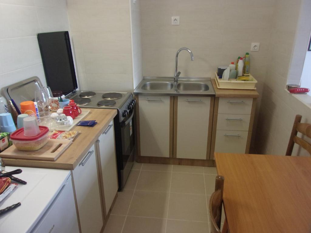 Kuchyň nebo kuchyňský kout v ubytování Rooms Port