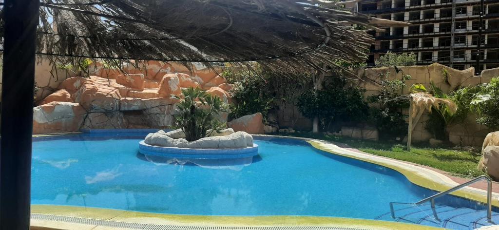 Bazén v ubytování La Cala de Finestrat apartamento a pasos de mar!! nebo v jeho okolí