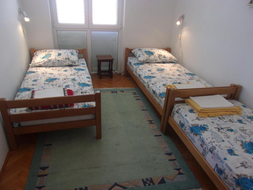 Postel nebo postele na pokoji v ubytování Rooms Port