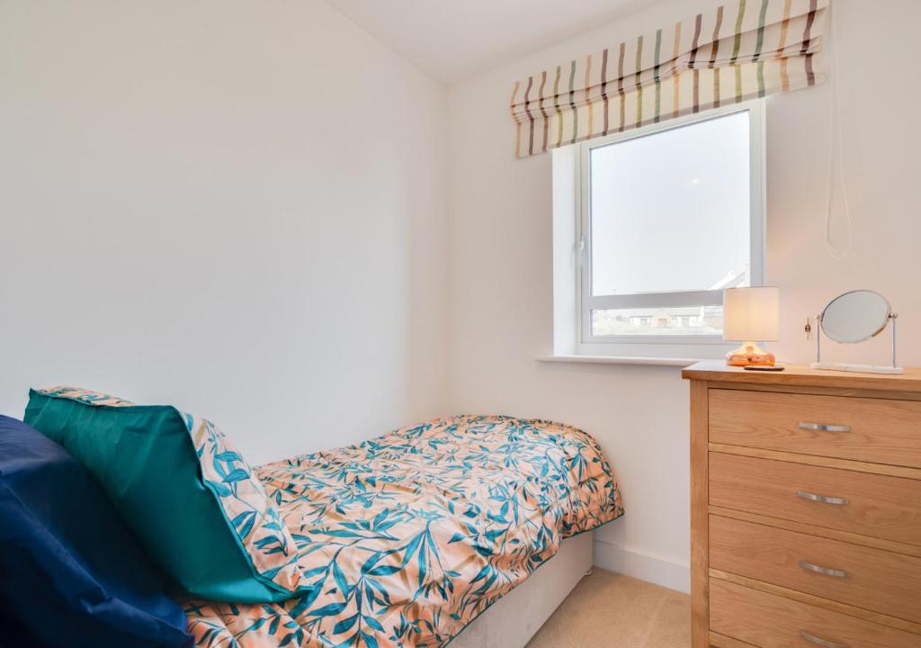 Postel nebo postele na pokoji v ubytování Sea Breezes