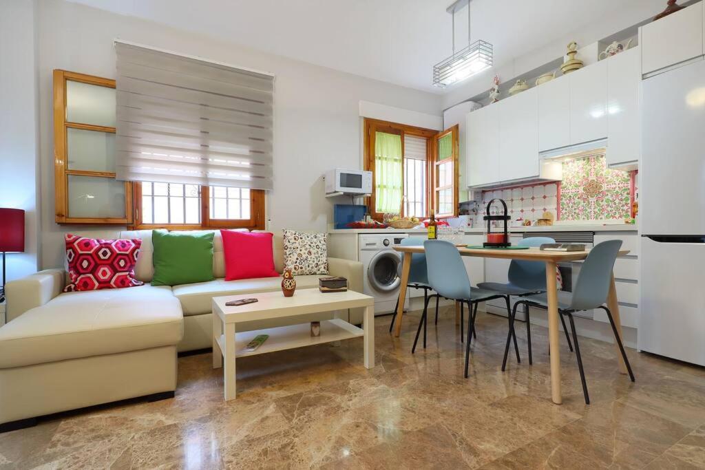 A kitchen or kitchenette at casa de los patios amurallados