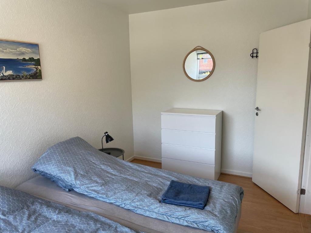 Postel nebo postele na pokoji v ubytování Havne huset