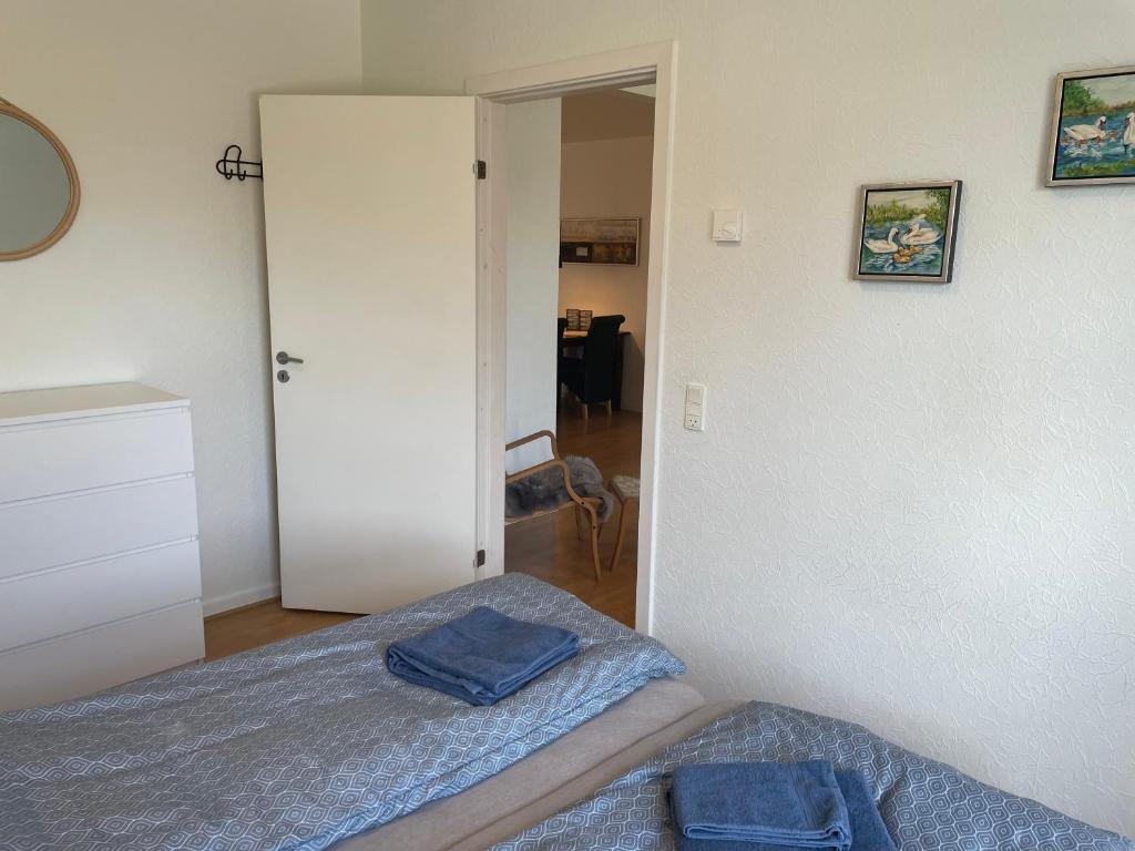 Postel nebo postele na pokoji v ubytování Havne huset