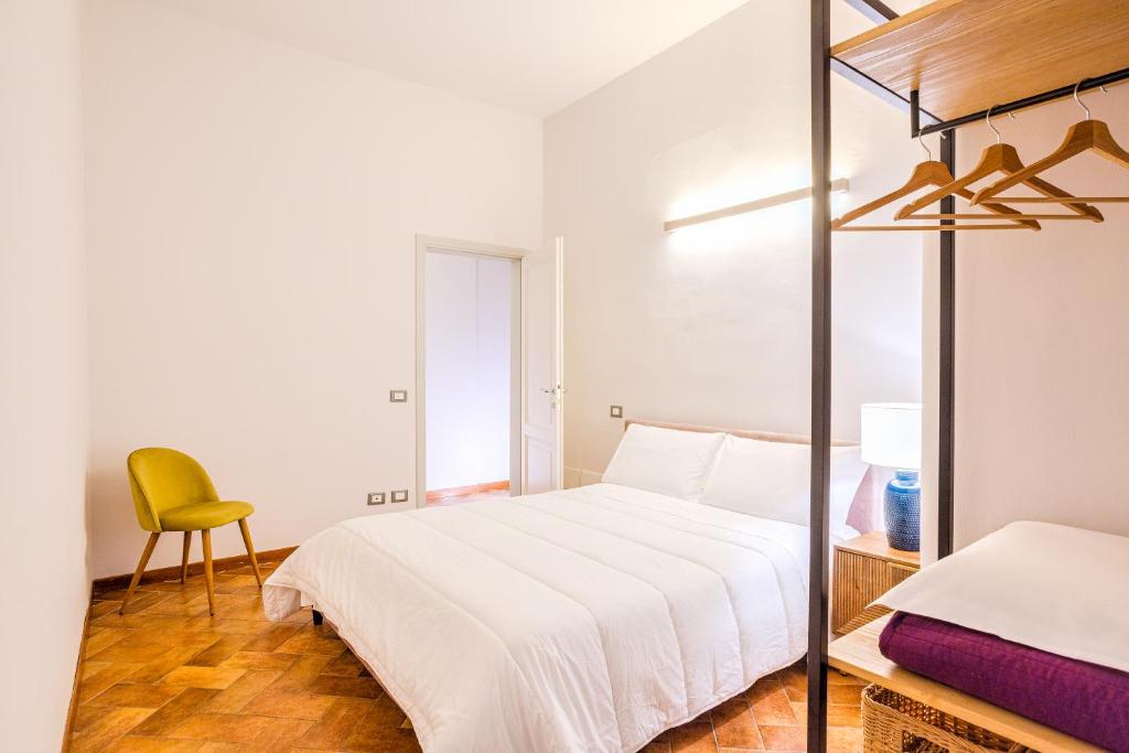 A bed or beds in a room at Condotta 16 Apartments