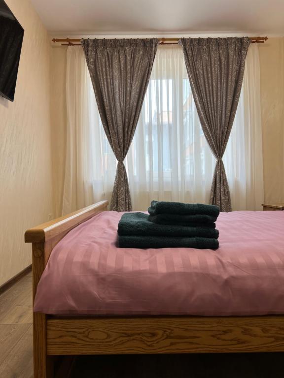 Ліжко або ліжка в номері Eco Apartments Melnyka10