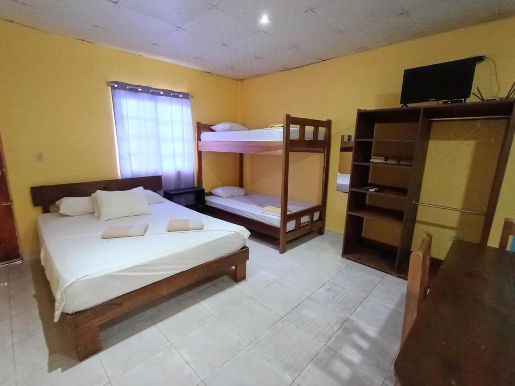 Postel nebo postele na pokoji v ubytování Sun Havens Apartments & Suites