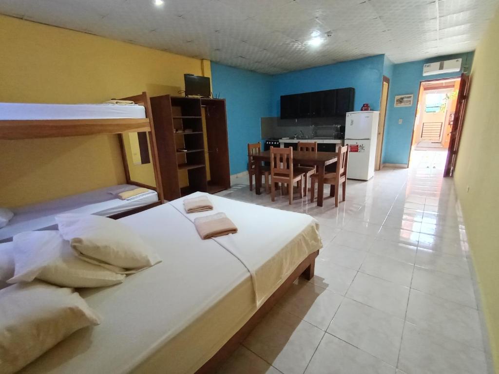 Postel nebo postele na pokoji v ubytování Sun Havens Apartments & Suites