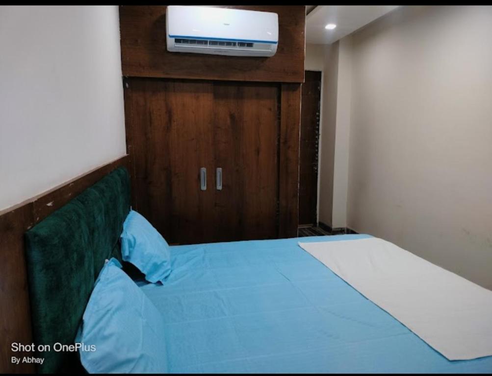 Sangam Resort & Hotel tesisinde bir odada yatak veya yataklar