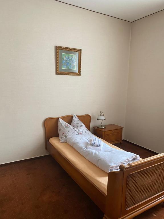 Postel nebo postele na pokoji v ubytování Penzión TATRA INN