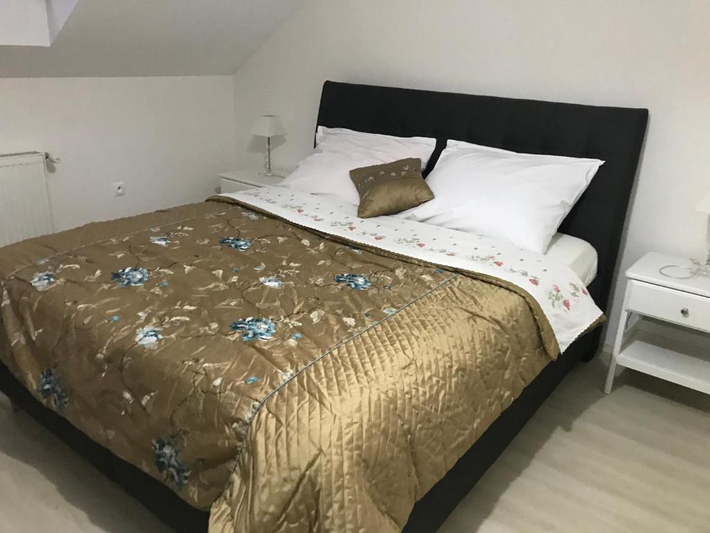 Postel nebo postele na pokoji v ubytování Penzión TATRA INN