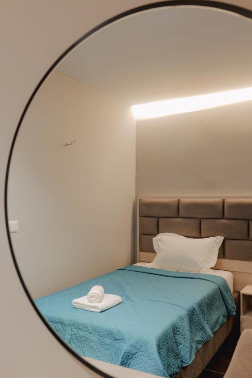 Una cama o camas en una habitación de Casa Del Mar