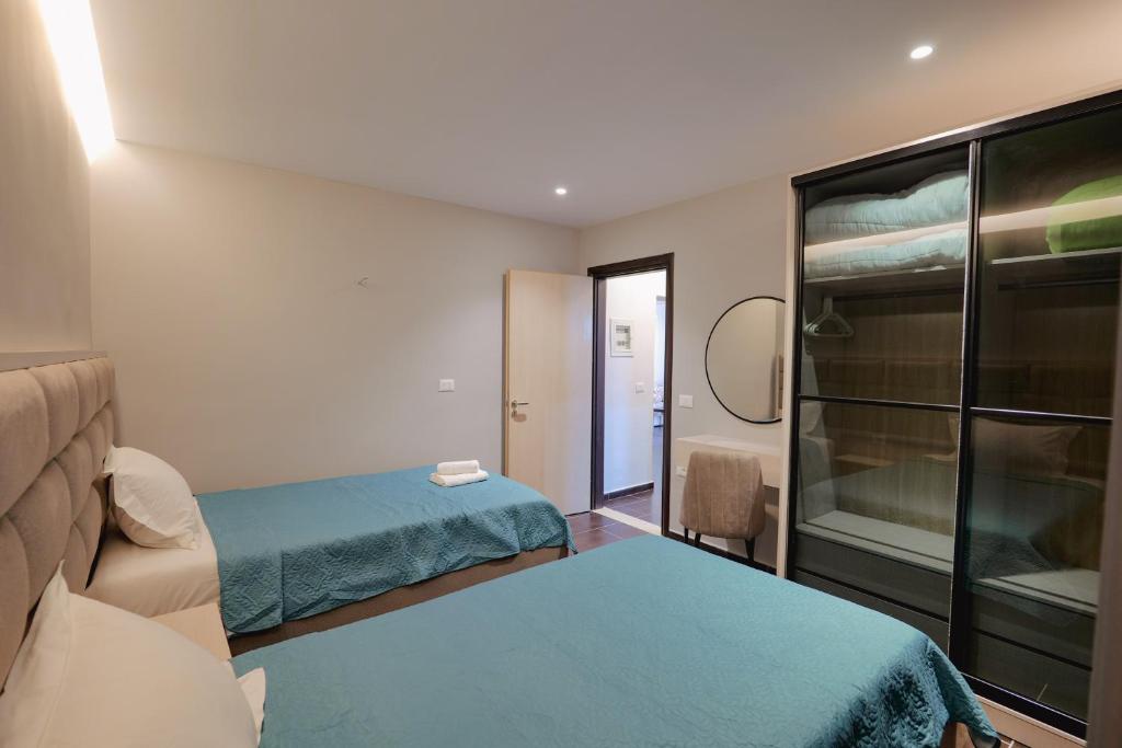 Una cama o camas en una habitación de Casa Del Mar