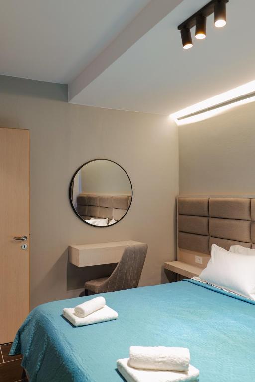 Una cama o camas en una habitación de Casa Del Mar