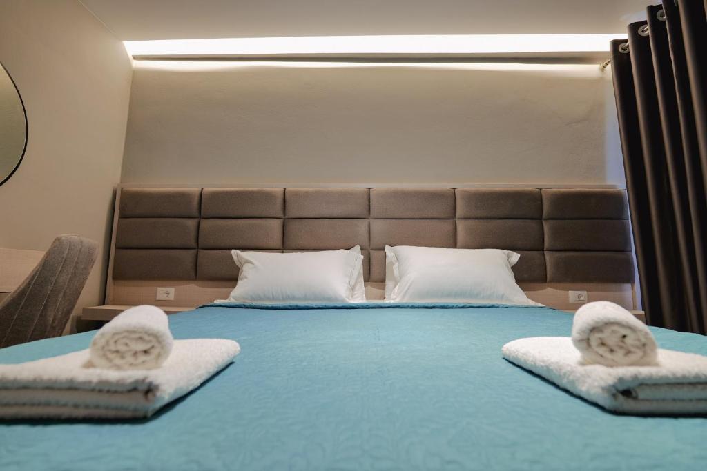 Una cama o camas en una habitación de Casa Del Mar