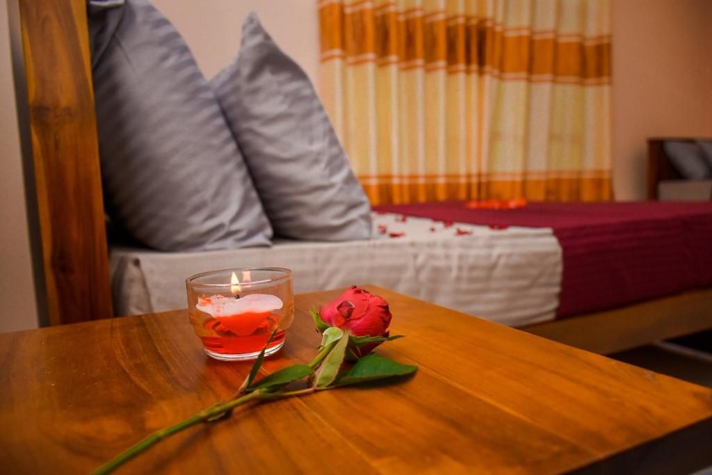 Postel nebo postele na pokoji v ubytování Woodnest Saayoo Resort