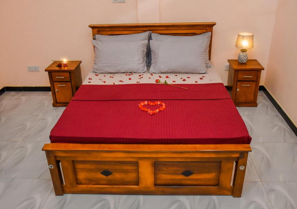 Postel nebo postele na pokoji v ubytování Woodnest Saayoo Resort