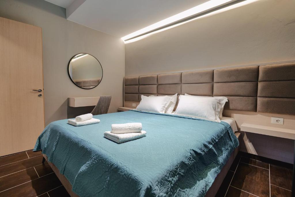 Una cama o camas en una habitación de Casa Del Mar