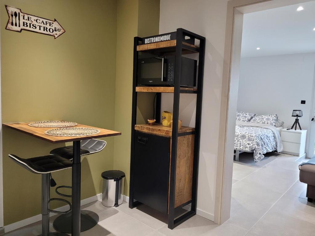 Postel nebo postele na pokoji v ubytování chambre gite au pied du Vieil Armand