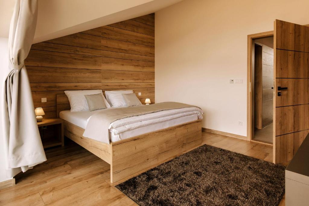 Postel nebo postele na pokoji v ubytování Villa Greystone