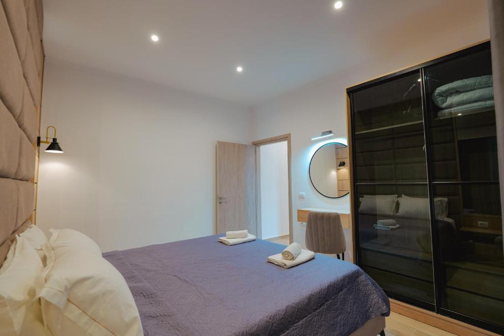 Una cama o camas en una habitación de Casa Del Mar